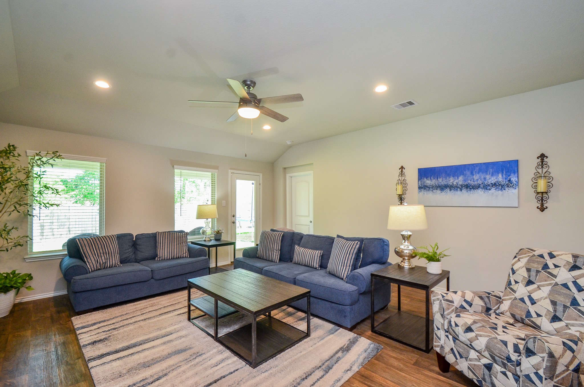 3810 Willow Valley Conroe, TX 77301 - Photo 18 of 38 a living room with furniture and a large window