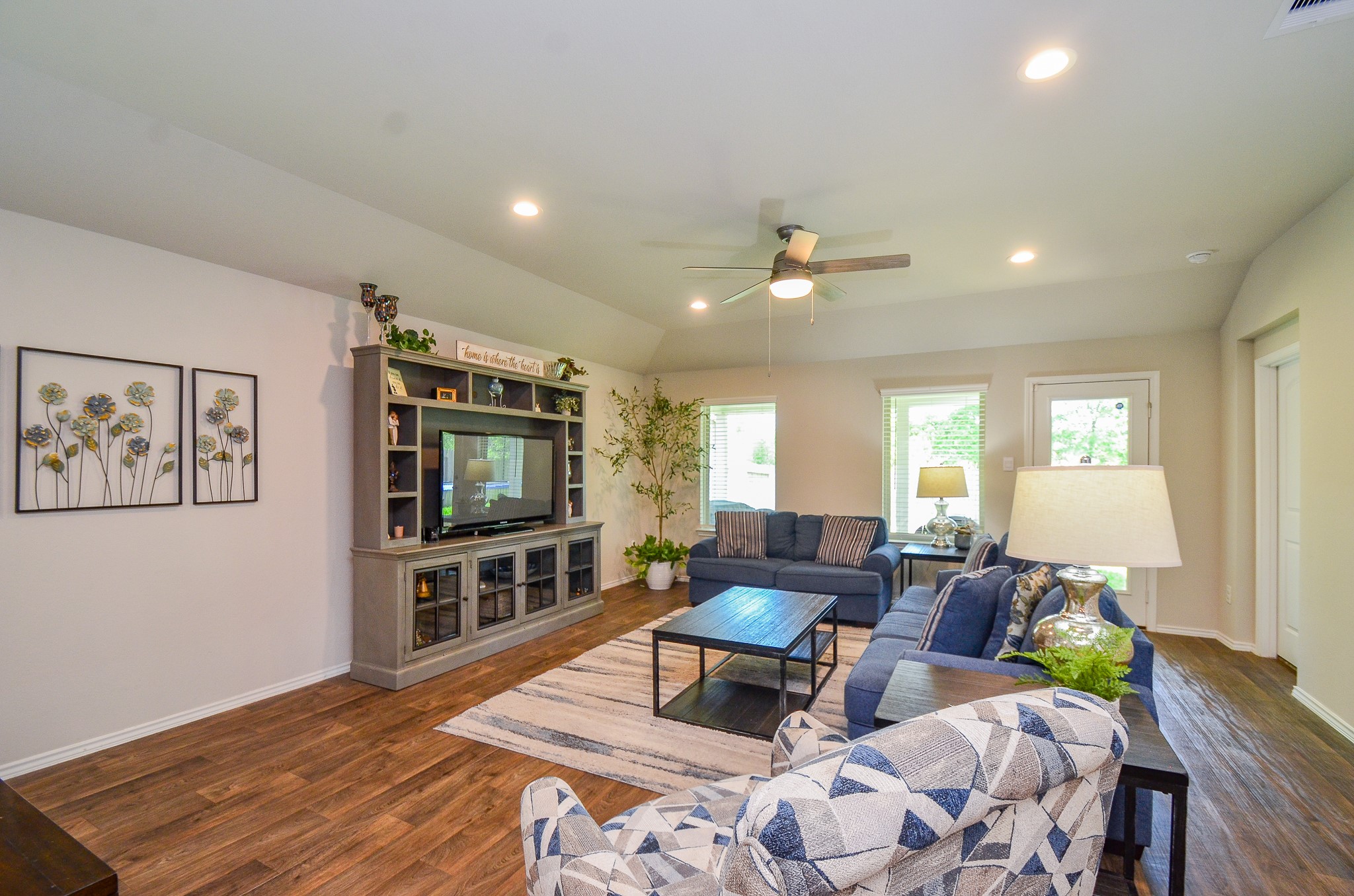 3810 Willow Valley Conroe, TX 77301 - Photo 19 of 38 a living room with furniture and a flat screen tv