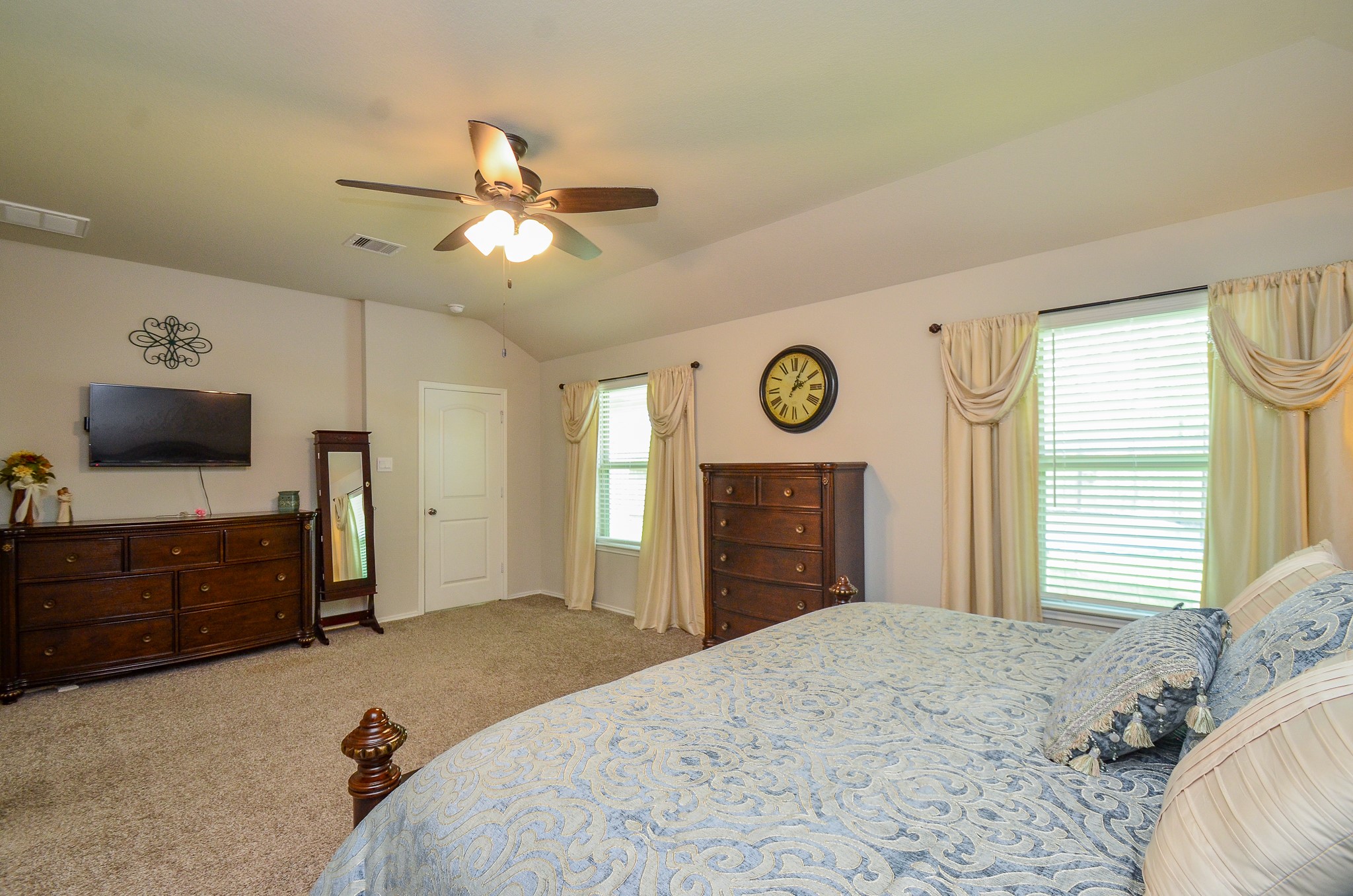 3810 Willow Valley Conroe, TX 77301 - Photo 21 of 38 a bedroom with a bed and a television
