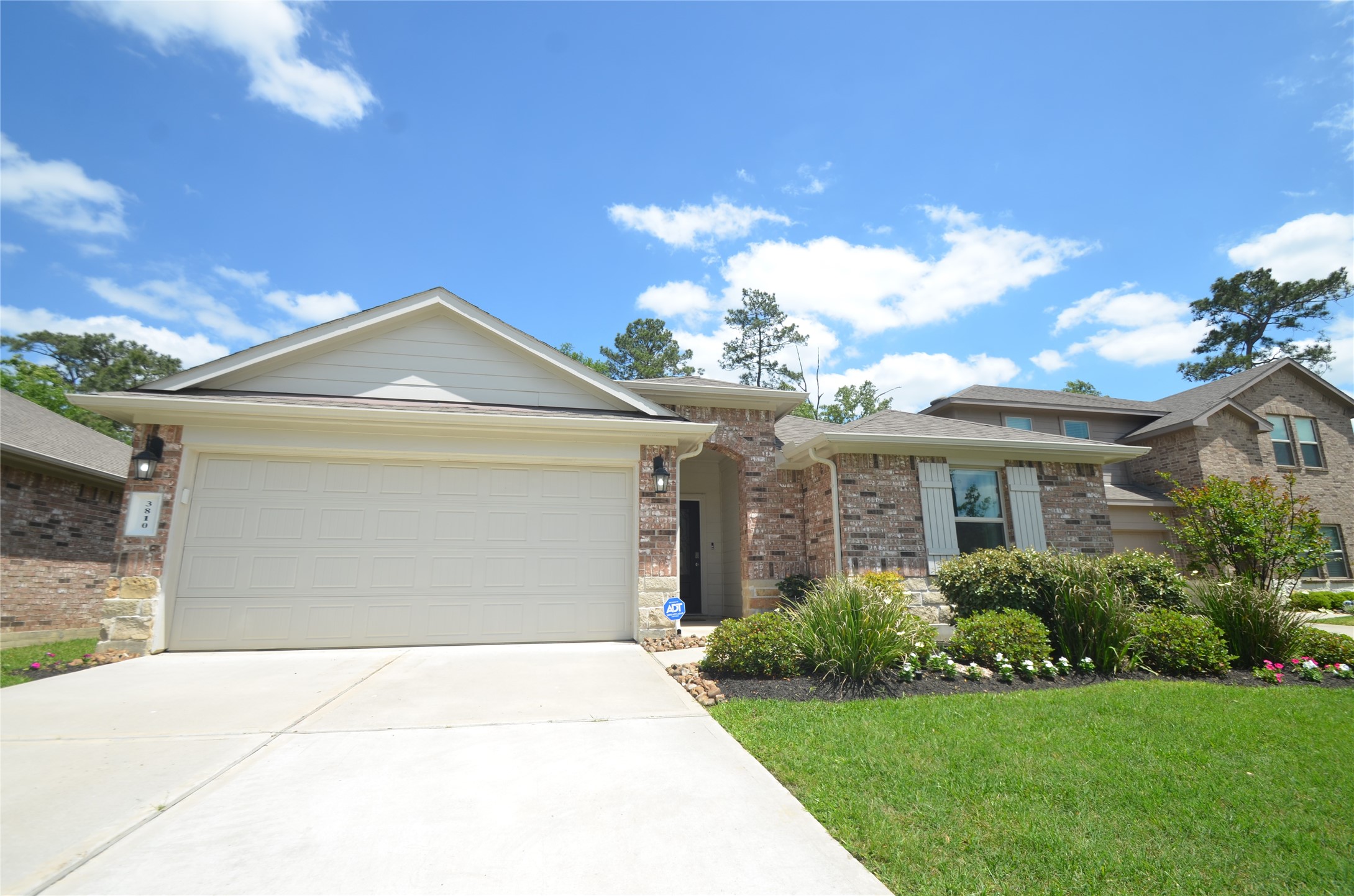 3810 Willow Valley Conroe, TX 77301 - Photo 36 of 38 a front view of a house with a yard