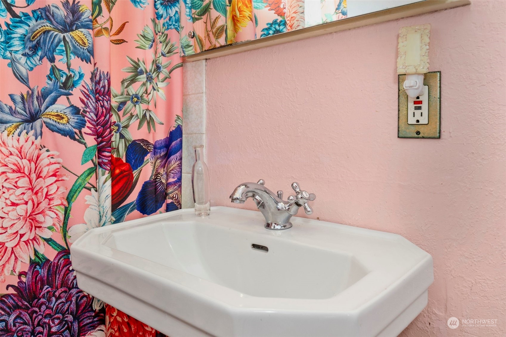 1745 4th Street Bremerton, WA 98337 - Photo 14 of 29 a bathroom with a sink and mirror with painted walls