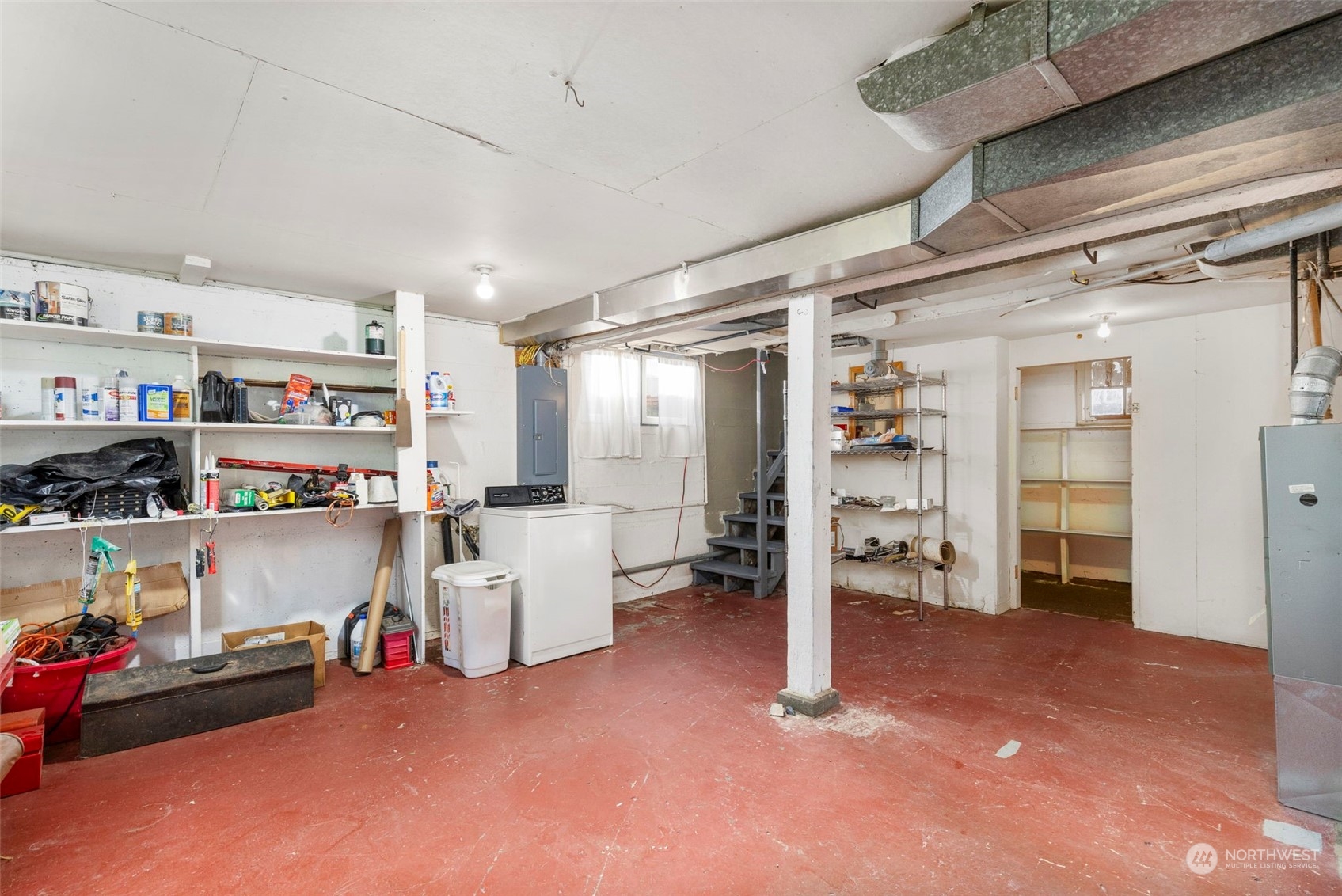 1745 4th Street Bremerton, WA 98337 - Photo 18 of 29 a view of a storage & utility room with racks shoes