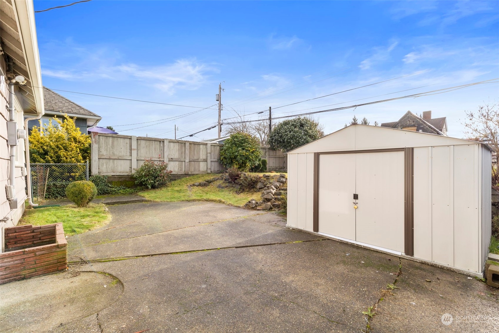1745 4th Street Bremerton, WA 98337 - Photo 20 of 29 a view of a house with a yard