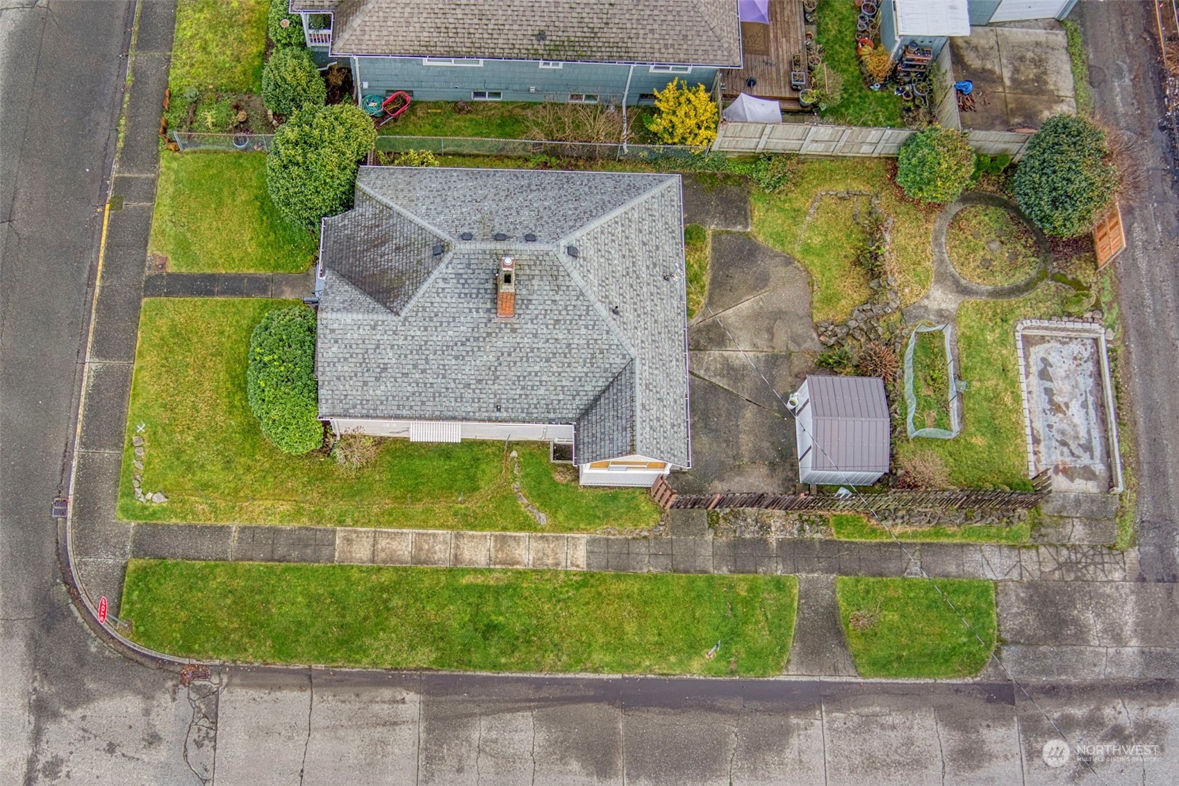1745 4th Street Bremerton, WA 98337 - Photo 29 of 29 an aerial view of a house with a swimming pool