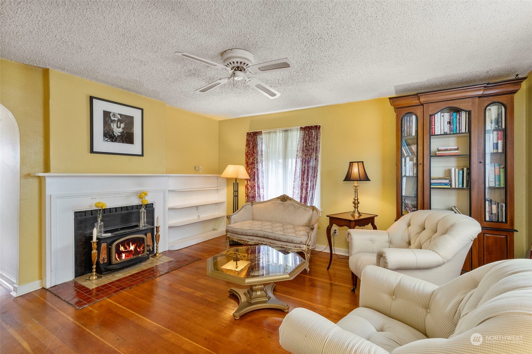 1745 4th Street Bremerton, WA 98337 - Photo 4 of 29 a living room with furniture and a fireplace