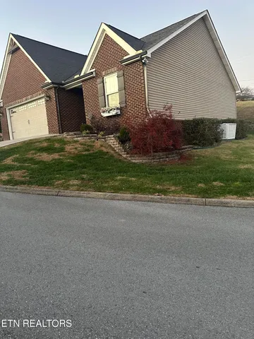 $310,000 | 156 Stonefield Drive, Harrogate, TN 37752