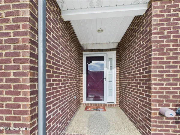 $310,000 | 156 Stonefield Drive, Harrogate, TN 37752