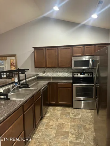 $310,000 | 156 Stonefield Drive, Harrogate, TN 37752