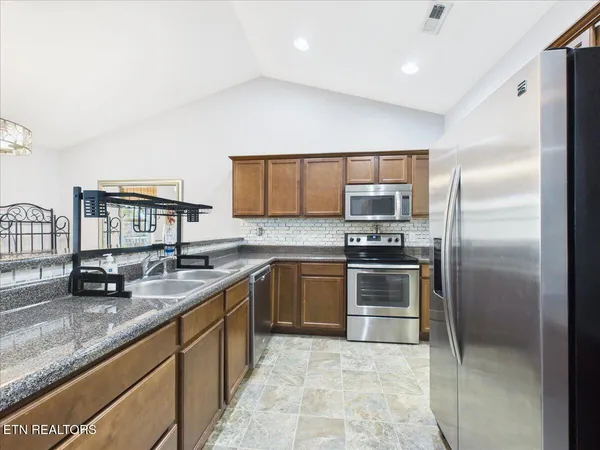 $310,000 | 156 Stonefield Drive, Harrogate, TN 37752