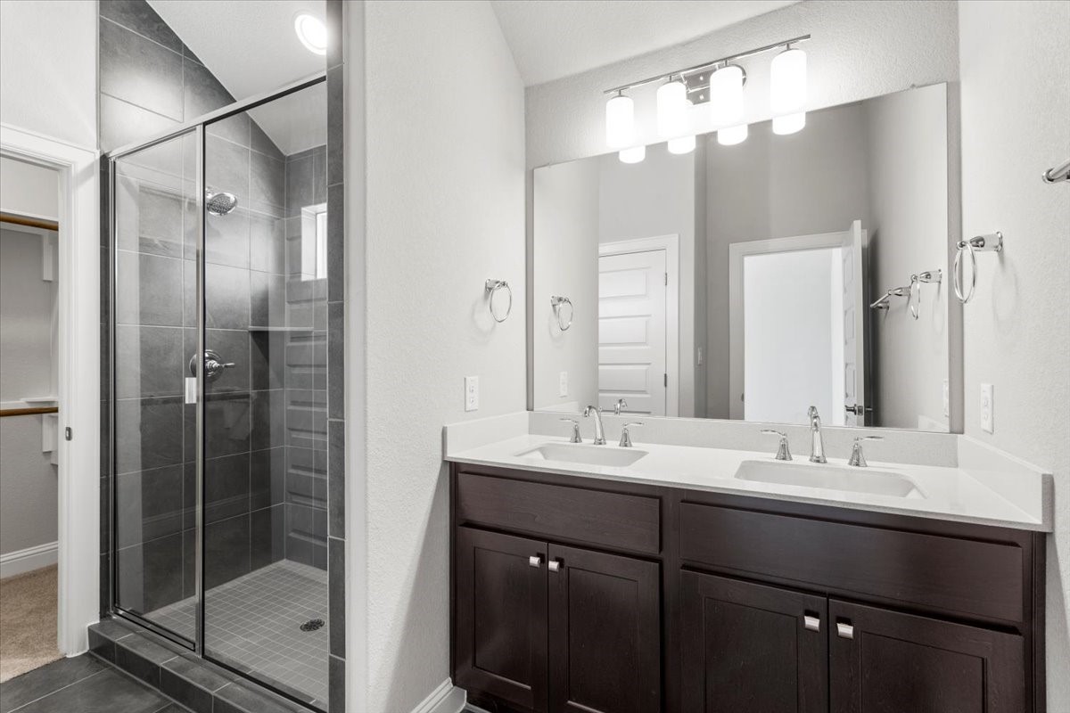 2605 Sam Bass Road, Unit 50 Round Rock, TX 78681 - Photo 17 of 30 Dual vanity in the primary suite