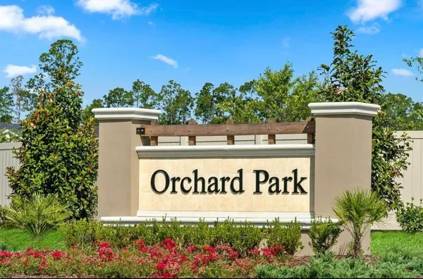 a sign that is on the wall of the building