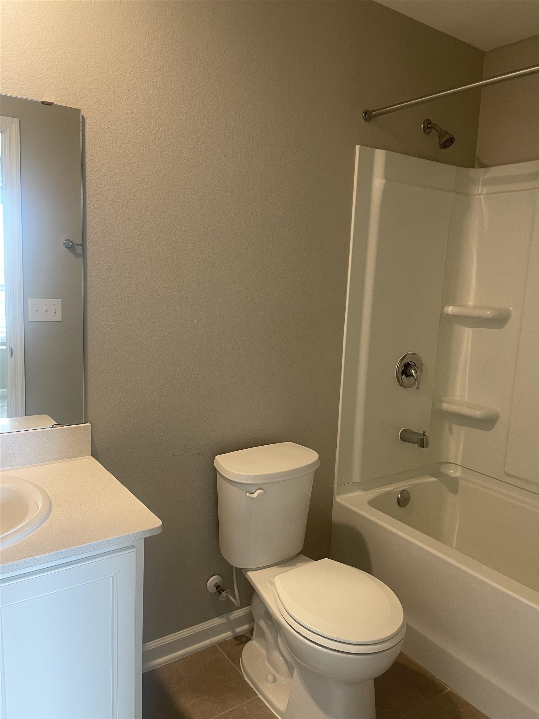 31 Great Star Court St. Augustine, FL 32086 - Photo 15 of 17 a white toilet sitting next to a bath tub