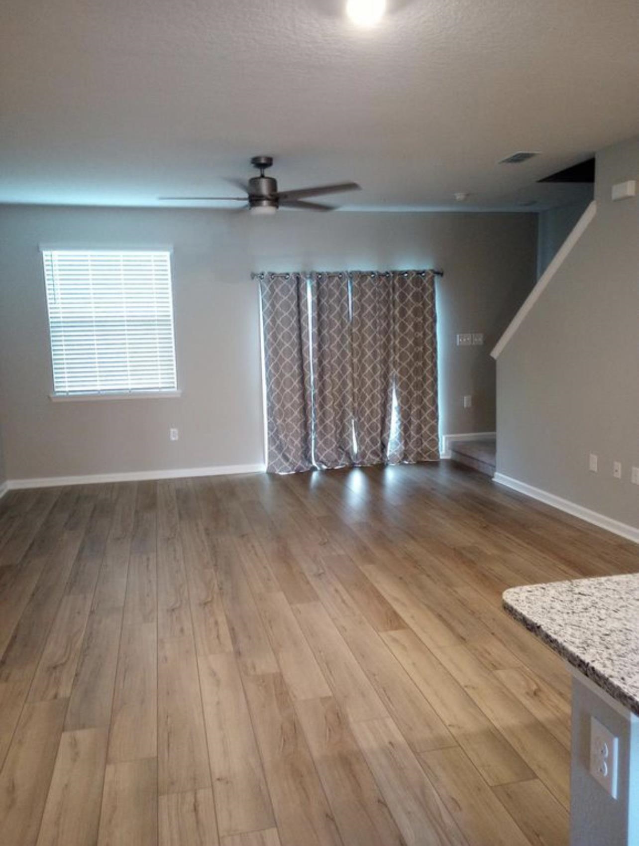 31 Great Star Court St. Augustine, FL 32086 - Photo 6 of 17 wooden floor in an empty room with a window