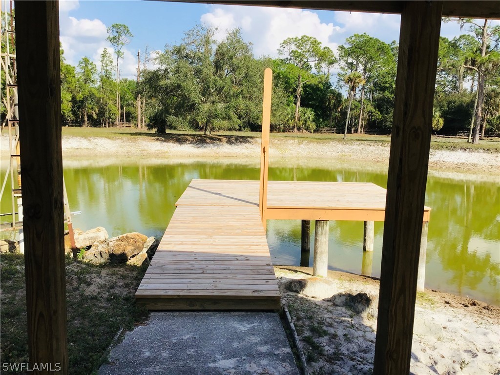 15291 Broken J Ranch Road Fort Myers, FL 33905 - Photo 18 of 33 a view of lake from deck