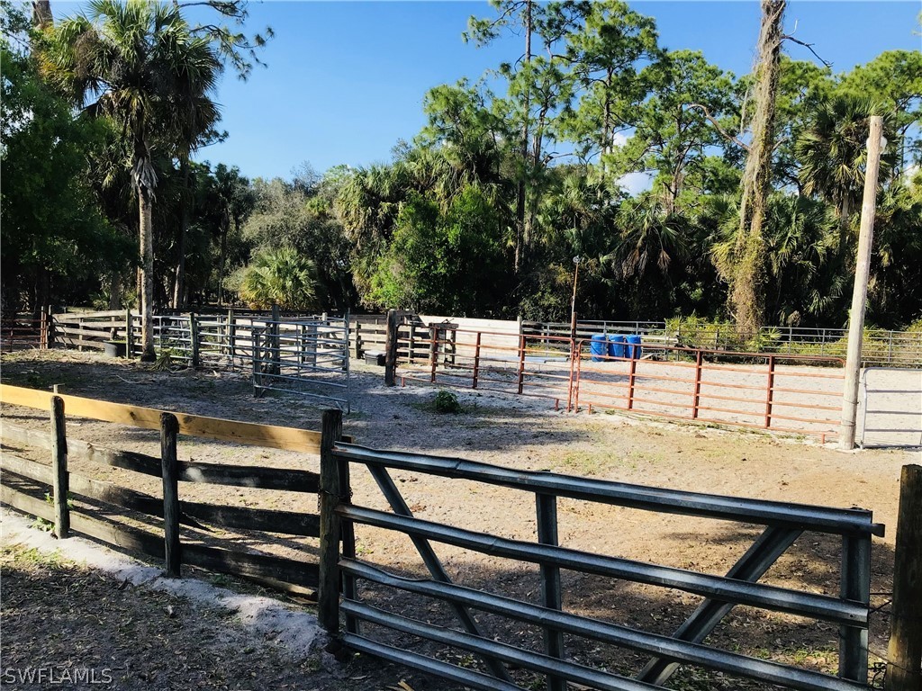 15291 Broken J Ranch Road Fort Myers, FL 33905 - Photo 21 of 33 a view of outdoor space with seating