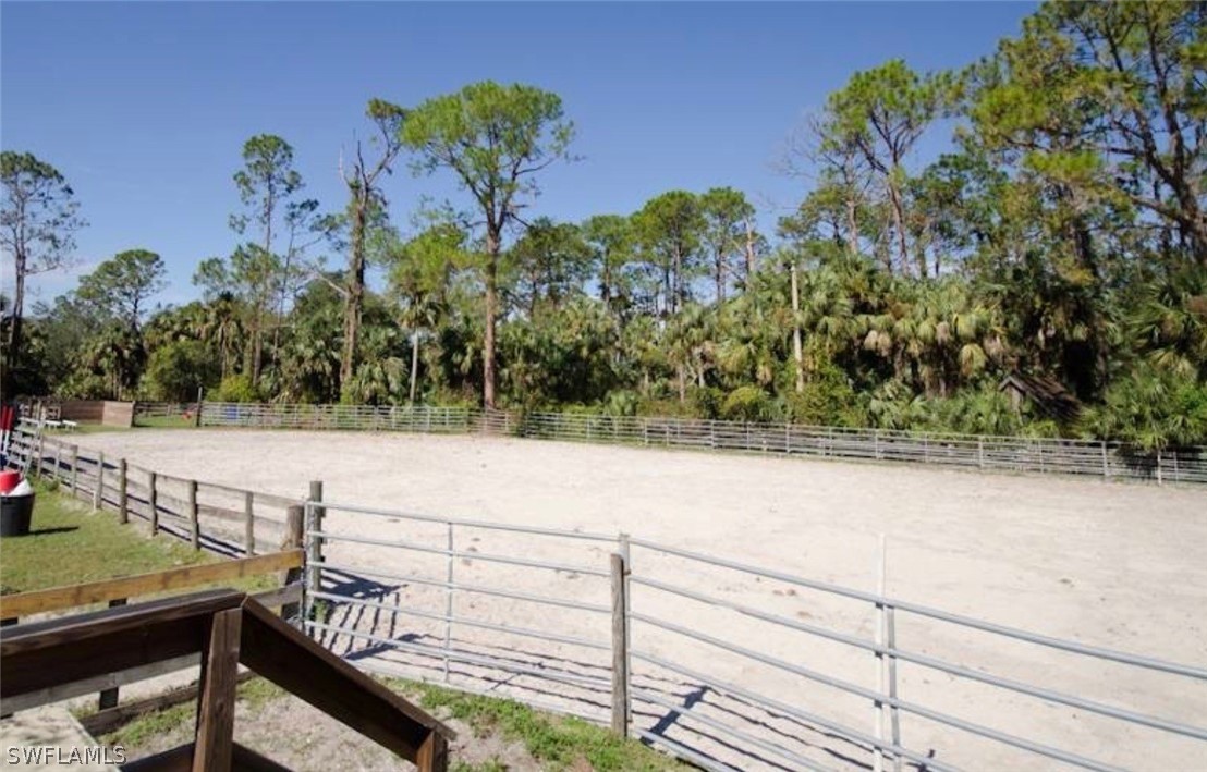 15291 Broken J Ranch Road Fort Myers, FL 33905 - Photo 33 of 33 a view of a terrace with trees