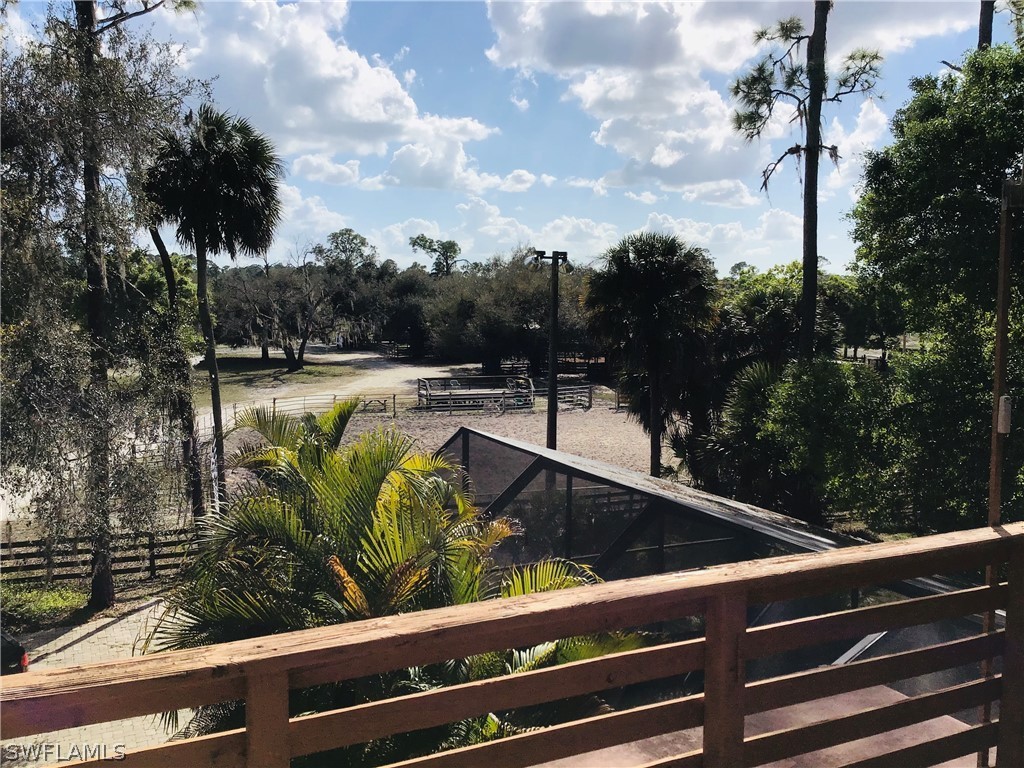 15291 Broken J Ranch Road Fort Myers, FL 33905 - Photo 8 of 33 a view of swimming pool from a balcony