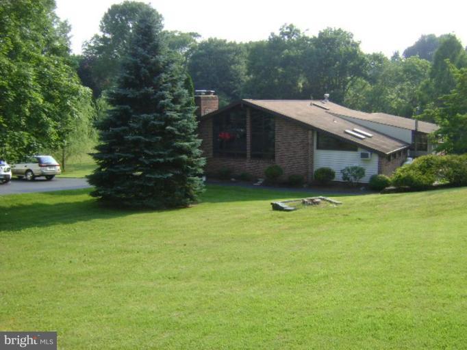 The lot is .86 acres with a portion fenced in.