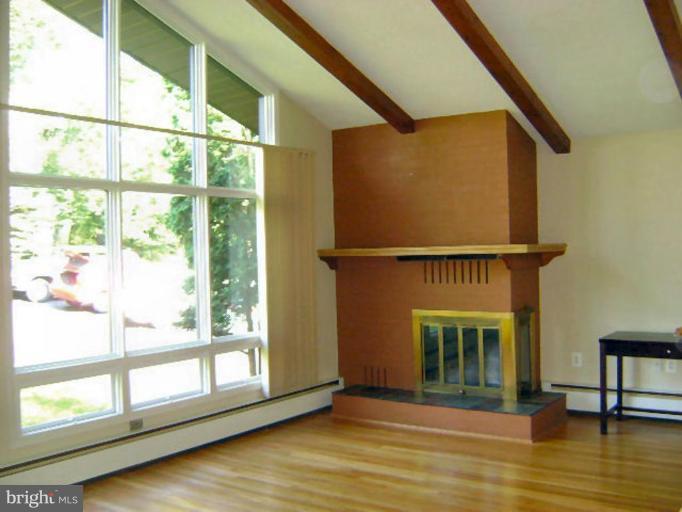 326 Old Joppa Road Fallston, MD 21047 - Photo 8 of 30 Gas FP in Living Rm w/newly finished Hardwood Fl