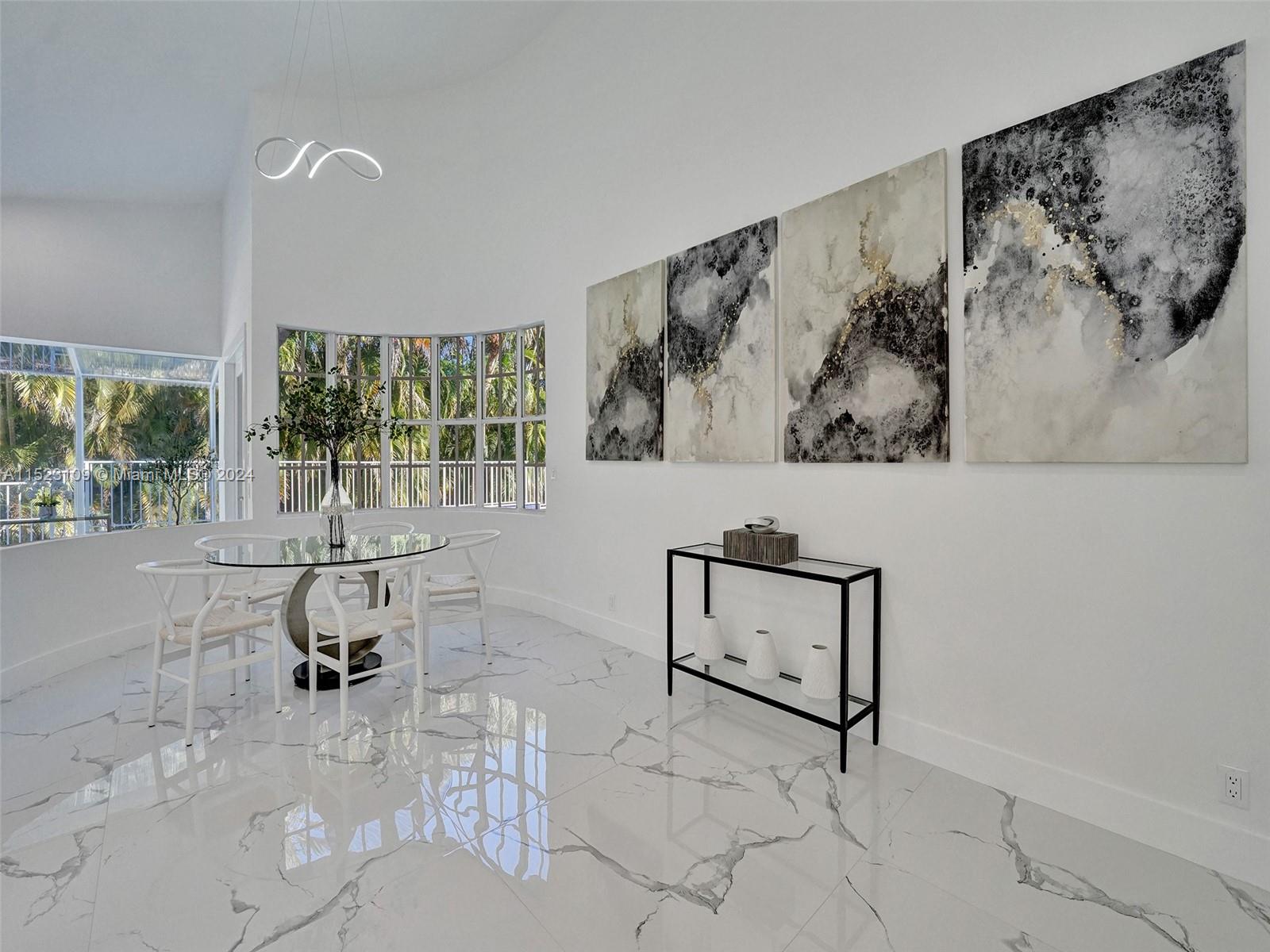 791 Parkside Circle North Boca Raton, FL 33486 - Photo 17 of 87 a living room with furniture and a painting on the wall