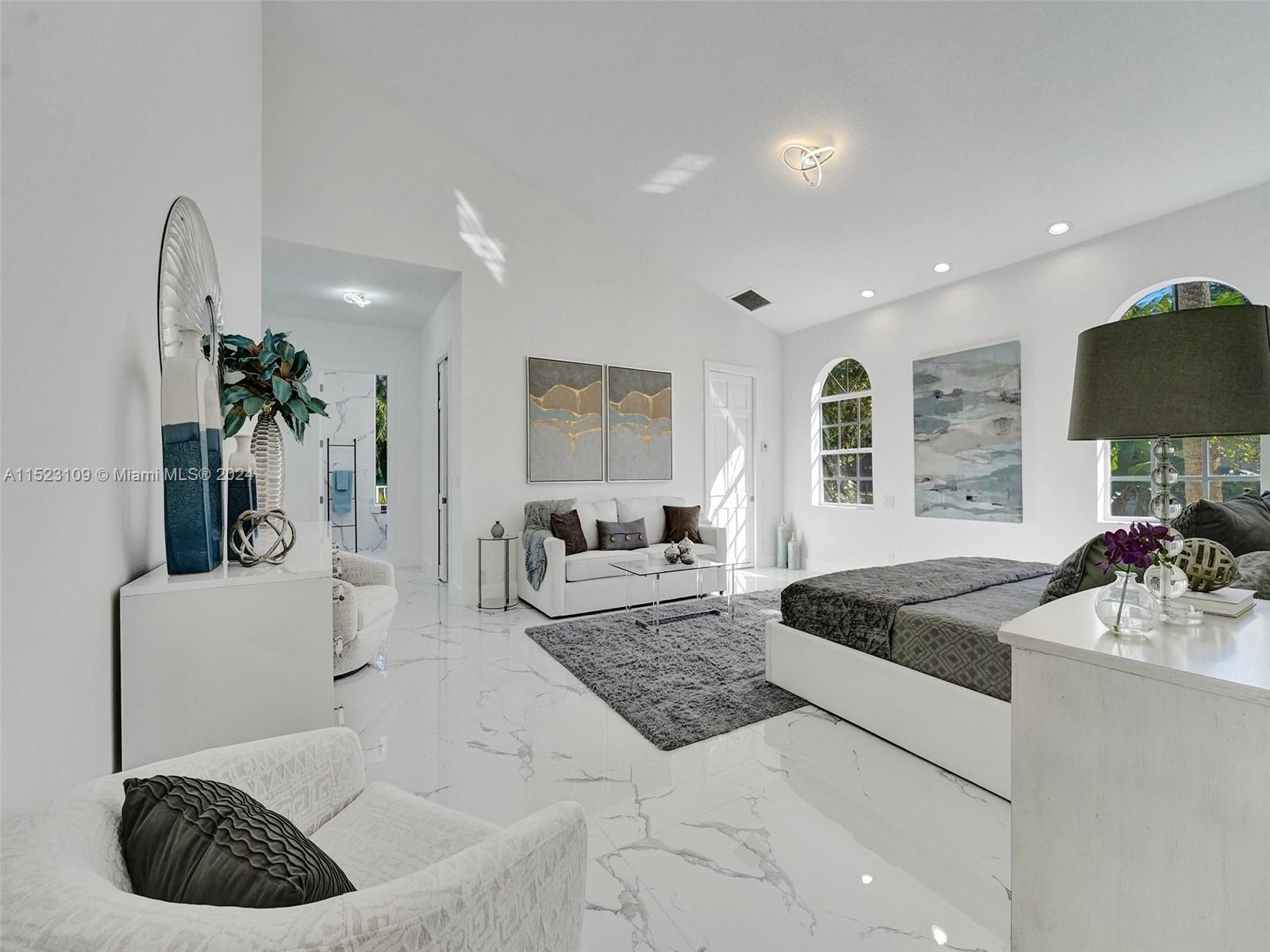 791 Parkside Circle North Boca Raton, FL 33486 - Photo 37 of 87 a living room with furniture and a flat screen tv