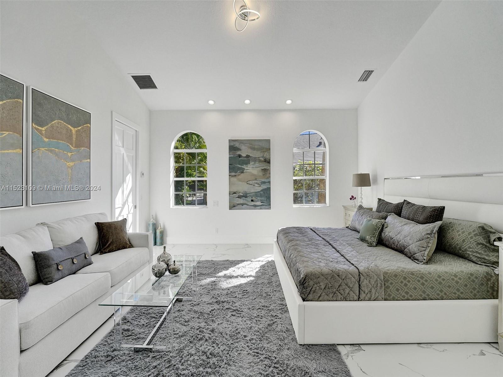 791 Parkside Circle North Boca Raton, FL 33486 - Photo 40 of 87 a living room with a couch and a large window