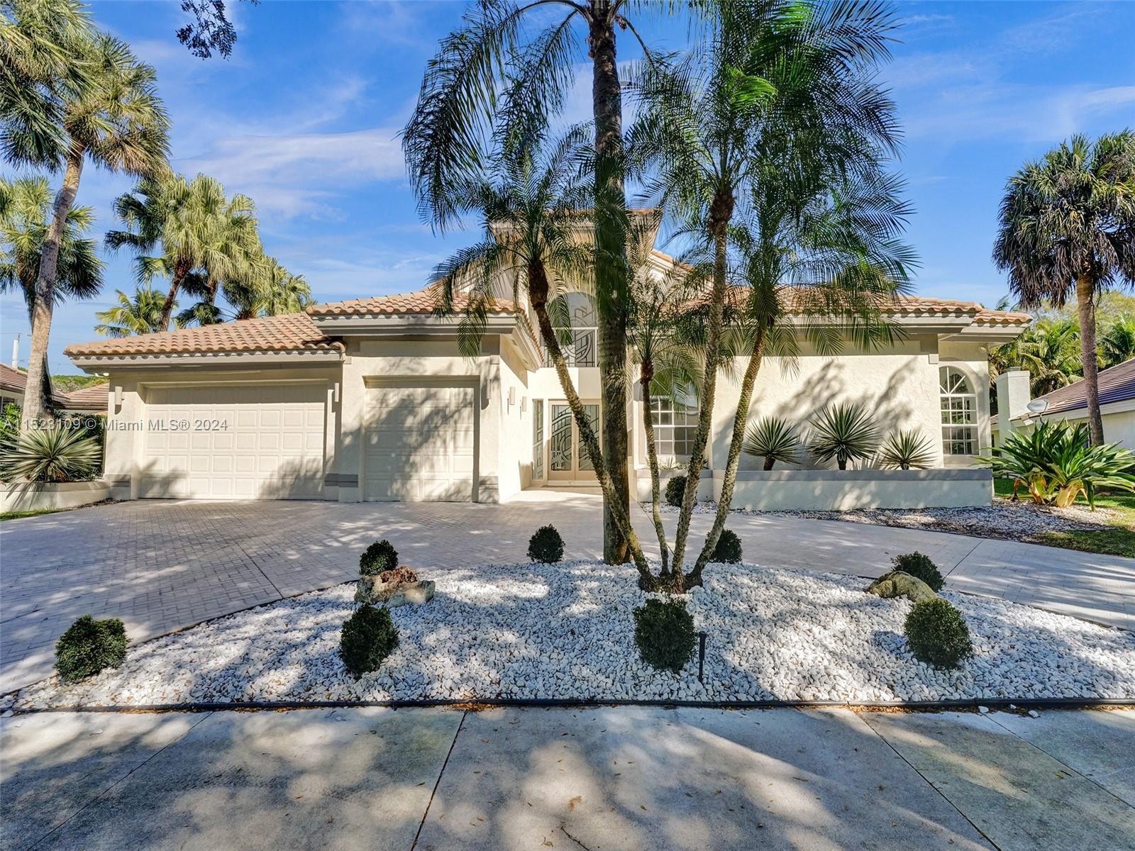 791 Parkside Circle North Boca Raton, FL 33486 - Photo 4 of 87 a view of a yard with plants