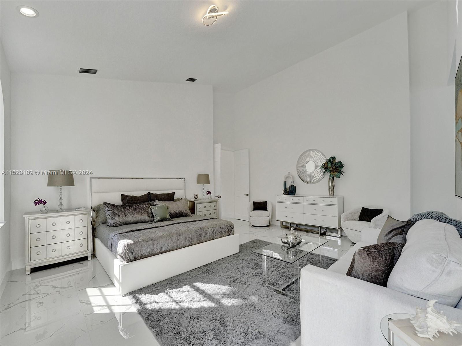 791 Parkside Circle North Boca Raton, FL 33486 - Photo 42 of 87 a living room with furniture and a couch