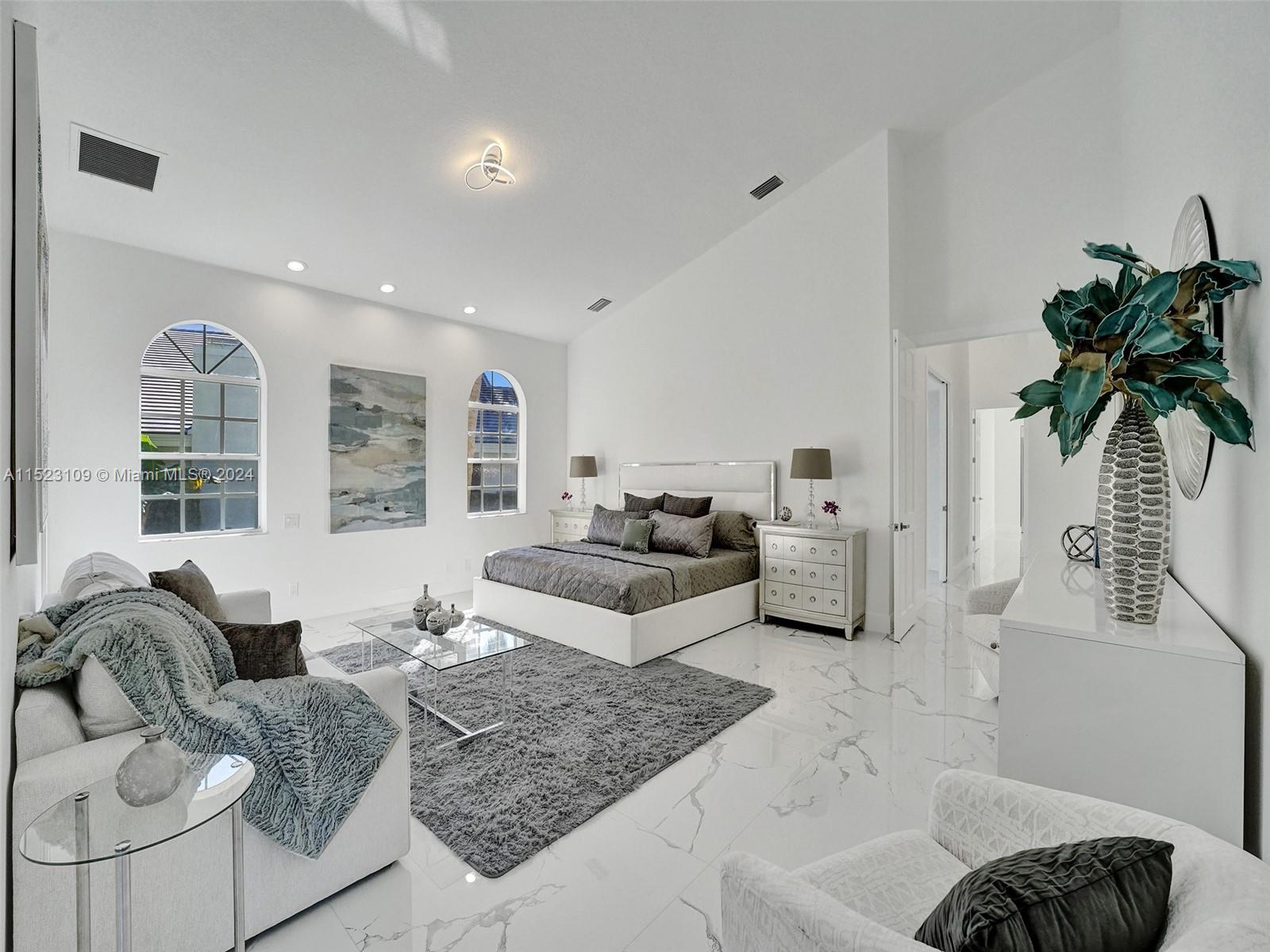 791 Parkside Circle North Boca Raton, FL 33486 - Photo 43 of 87 a living room with furniture and a large window