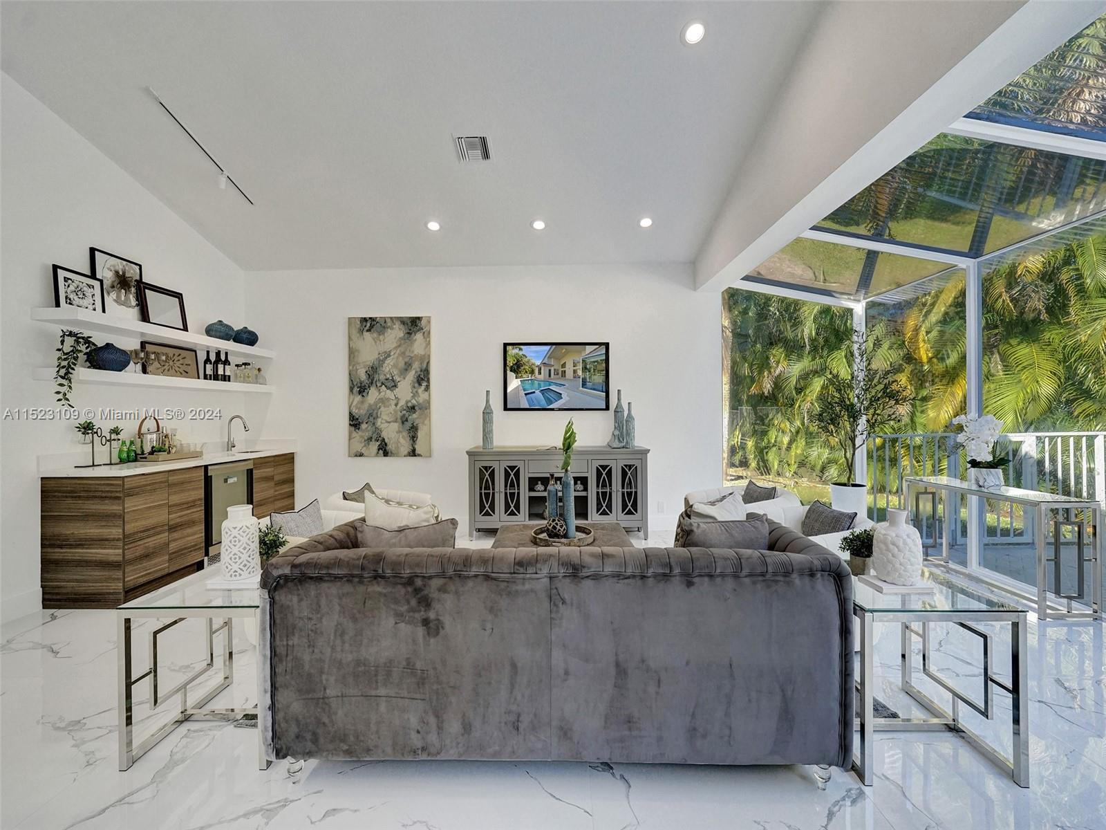 791 Parkside Circle North Boca Raton, FL 33486 - Photo 55 of 87 a living room with furniture and large window