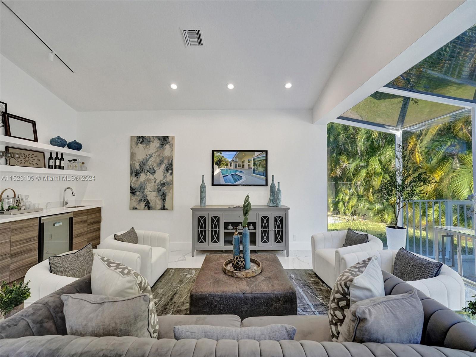 791 Parkside Circle North Boca Raton, FL 33486 - Photo 56 of 87 a living room with furniture and a large window