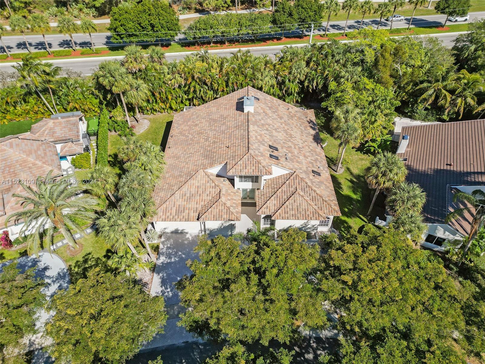 791 Parkside Circle North Boca Raton, FL 33486 - Photo 70 of 87 an aerial view of a house with a yard and lake view