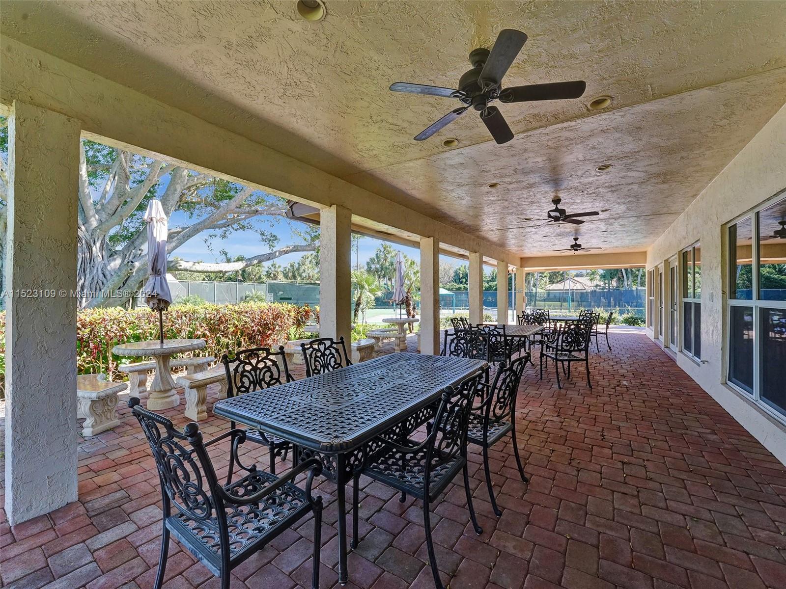 791 Parkside Circle North Boca Raton, FL 33486 - Photo 79 of 87 a view of a dining room with furniture window and outside view