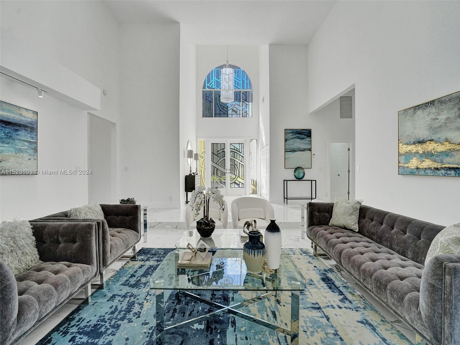 791 Parkside Circle North Boca Raton, FL 33486 - Photo 8 of 87 a living room with furniture and a window