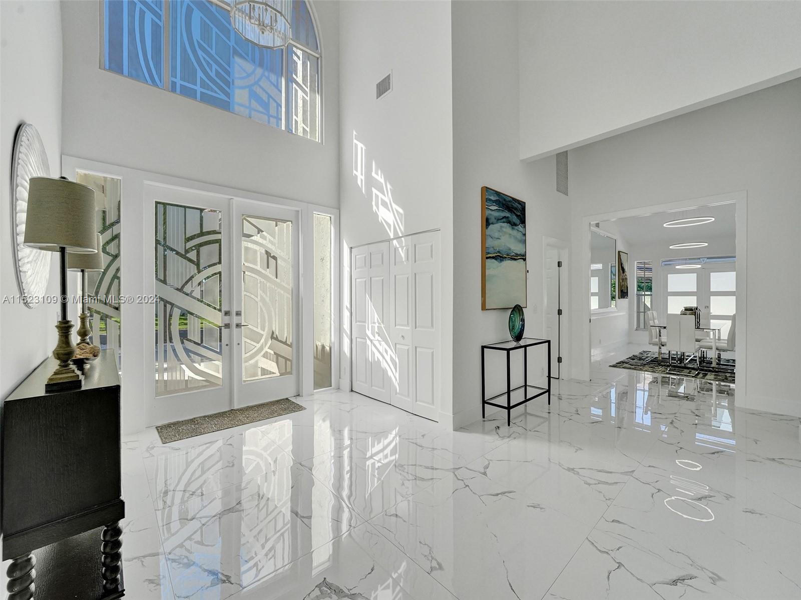 791 Parkside Circle North Boca Raton, FL 33486 - Photo 9 of 87 a view of a livingroom with furniture and windows