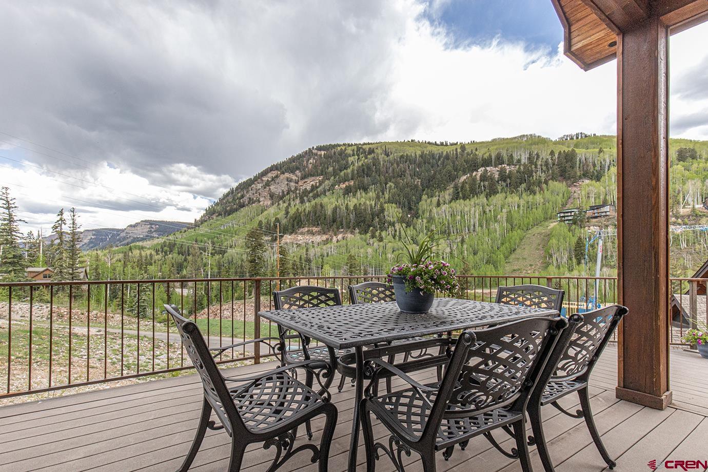 59 Snowden Drive Durango, CO 81301 - Photo 13 of 45 a view of a balcony with a table and chairs