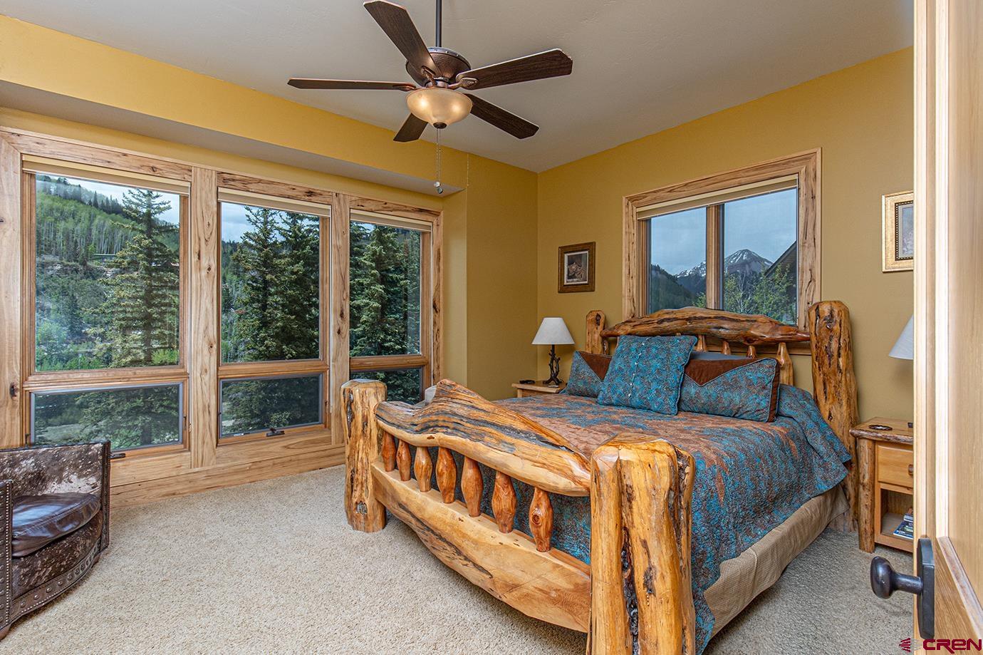 59 Snowden Drive Durango, CO 81301 - Photo 15 of 45 a bed sitting in a bedroom next to a window