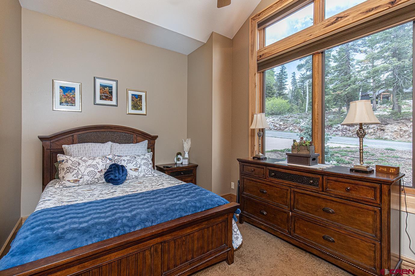 59 Snowden Drive Durango, CO 81301 - Photo 19 of 45 a bed sitting in a bedroom next to a window