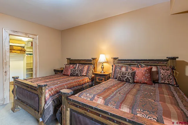 a view of balcony with wooden floor and fence