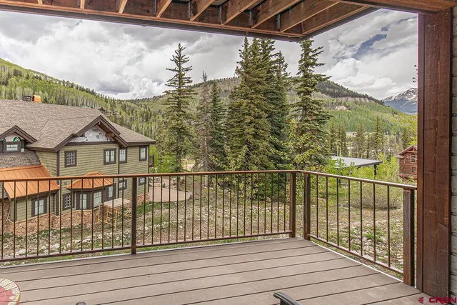 a view of house with outdoor seating