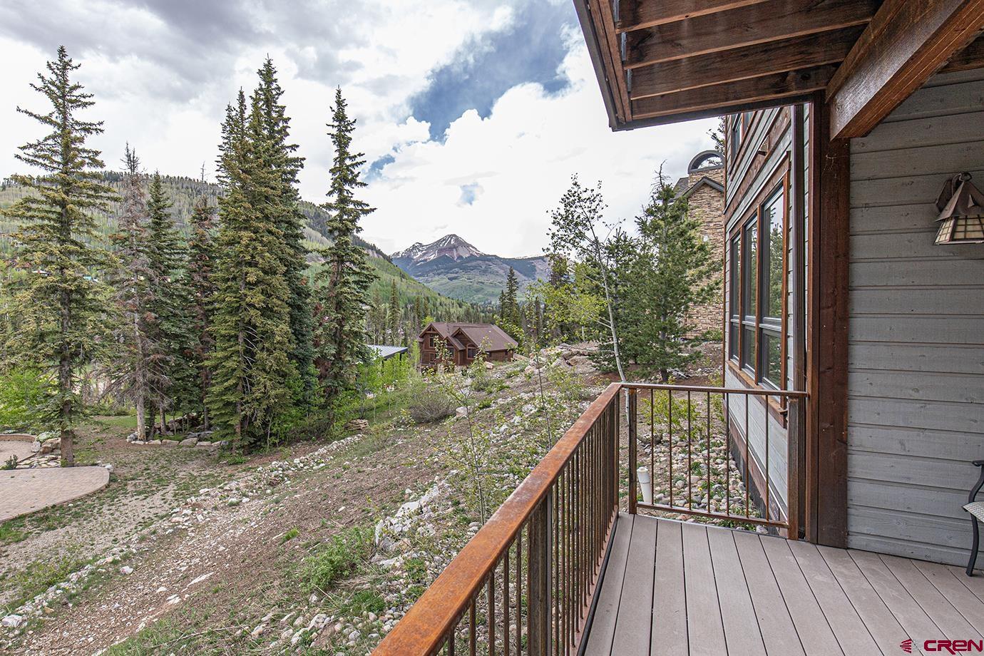 59 Snowden Drive Durango, CO 81301 - Photo 29 of 45 a view of balcony with wooden floor and fence