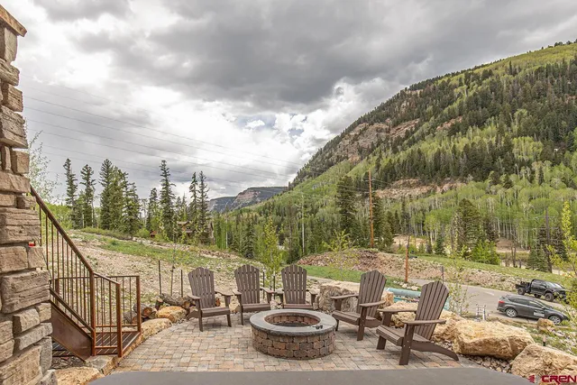 a view of a city with mountains