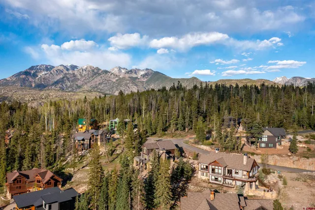 a view of a room with lots of furniture