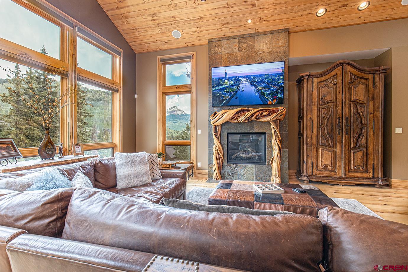59 Snowden Drive Durango, CO 81301 - Photo 6 of 45 a living room with furniture and a fireplace