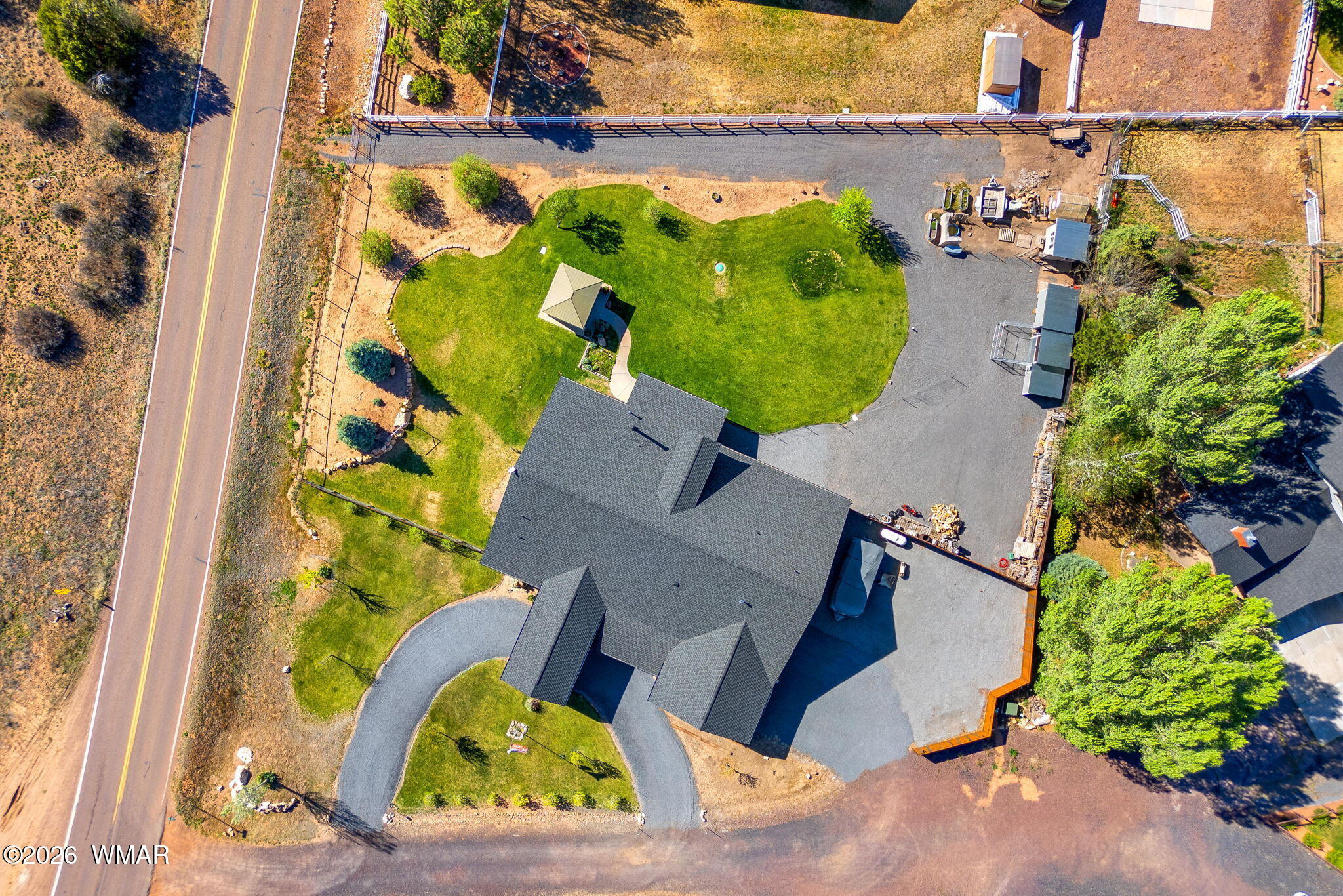 1940 Stonegate Way Heber, AZ 85928 - Photo 53 of 62 an aerial view of a house with a garden and yard