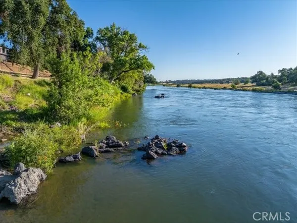 an aerial view of residential building and lake
