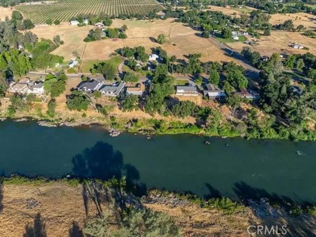 a view of a road with a bench in the background