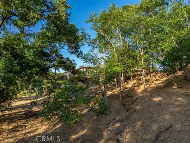 a view of a lake with houses in the back