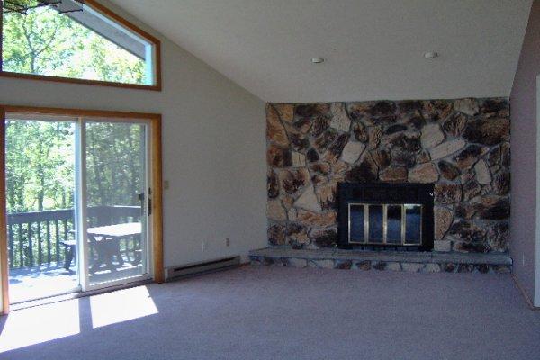 2212 Inverhouse Road Henryville, PA 18332 - Photo 7 of 17 Living Room with Stone Fireplace