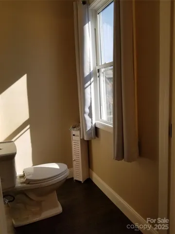 a bathroom with a toilet